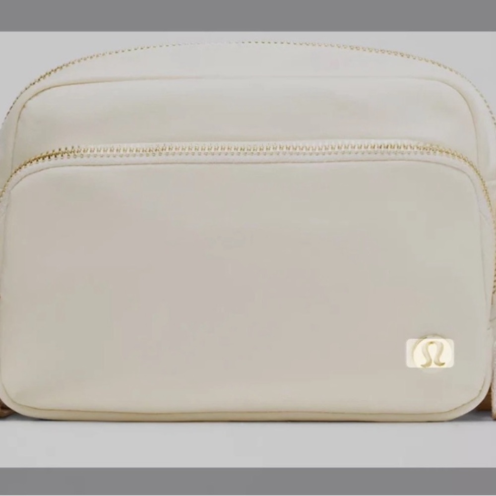 Lululemon Athletica Cream Crossbody Bag with side pocket. Open to offers
